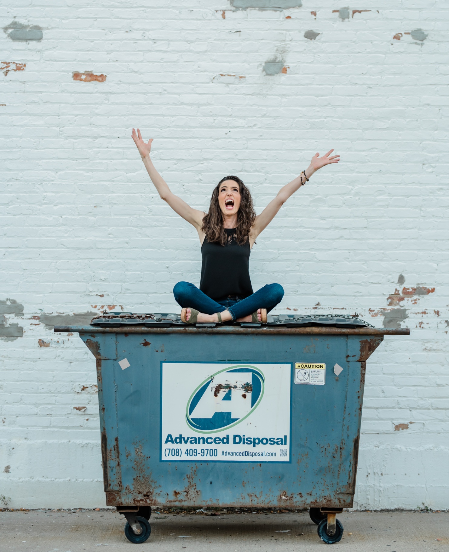 Stressed woman on top of dumpster for panic disorder